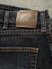 Vintage Lee Riders jeans featuring a dark wash denim Regular Fit 5-Pocket Design