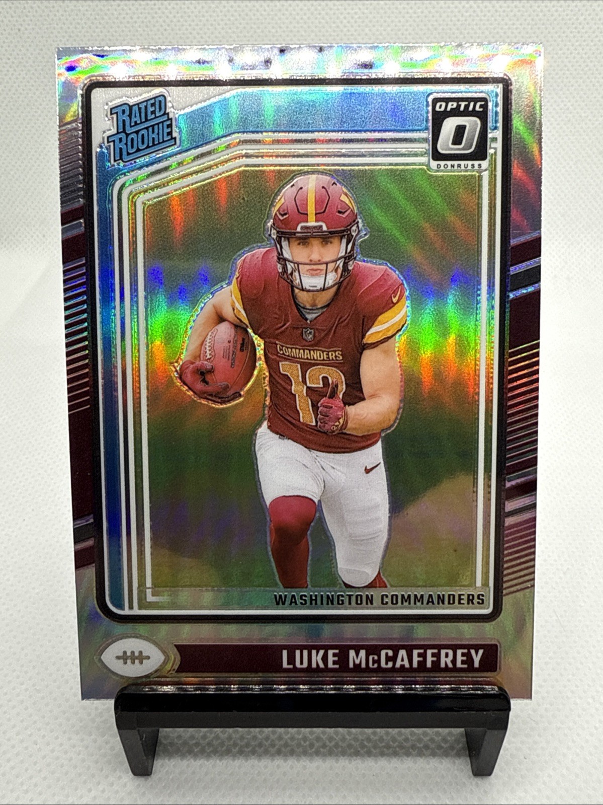2024 Panini Donruss Optic - Rated Rookie Luke McCaffrey #268 Holo Prizm (RC)