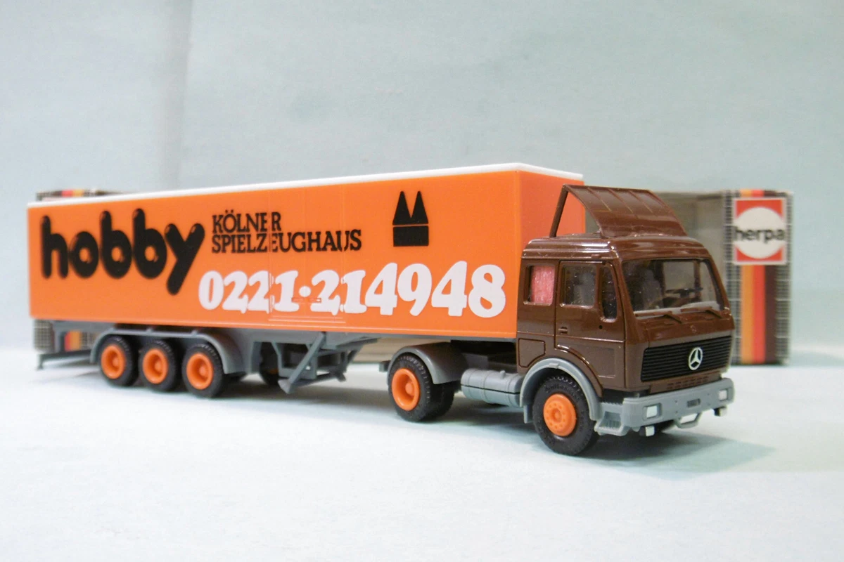 Camion Poubelle MB Econic Faun Variopress Herpa 1/87 – Orange – Édition Limitée 2013