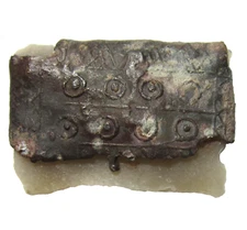 LATE ROMAN-BYZANTINE  FLINT AND LEAD FIRE STRIKER. CIRCA 300-600 AD.