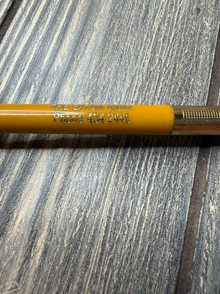 Bolígrafo amarillo vintage The Eaton Bank Colorado con detalles dorados Foto 3 de 4