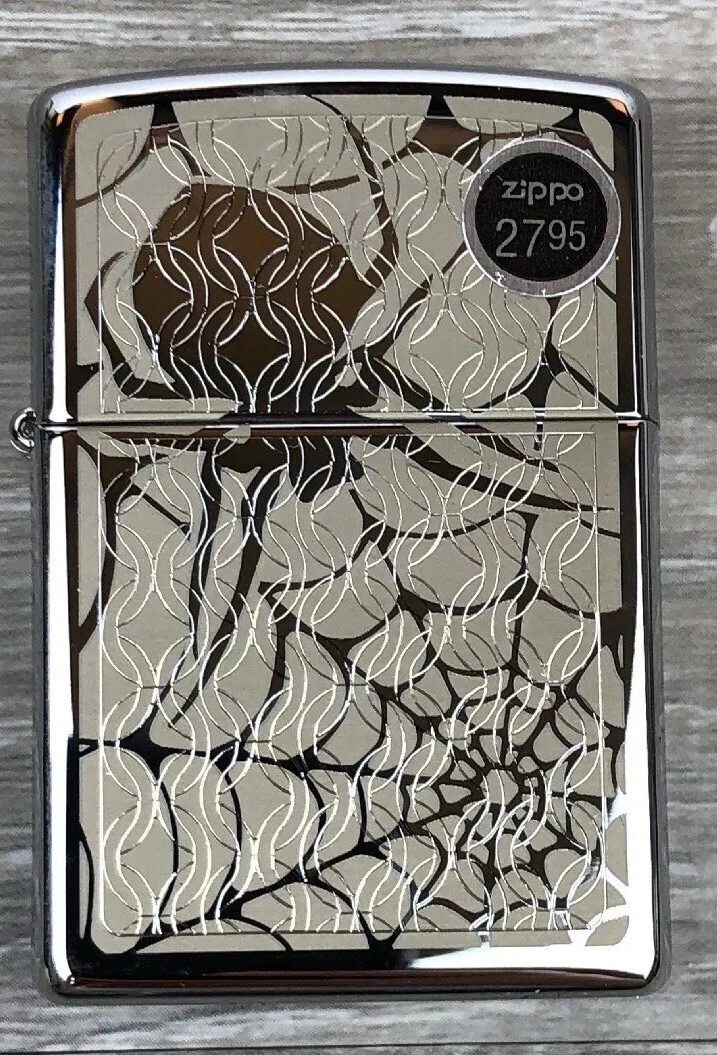 ZIPPO HIDDEN SPIDER IN WEB HIGH POLISH CHROME