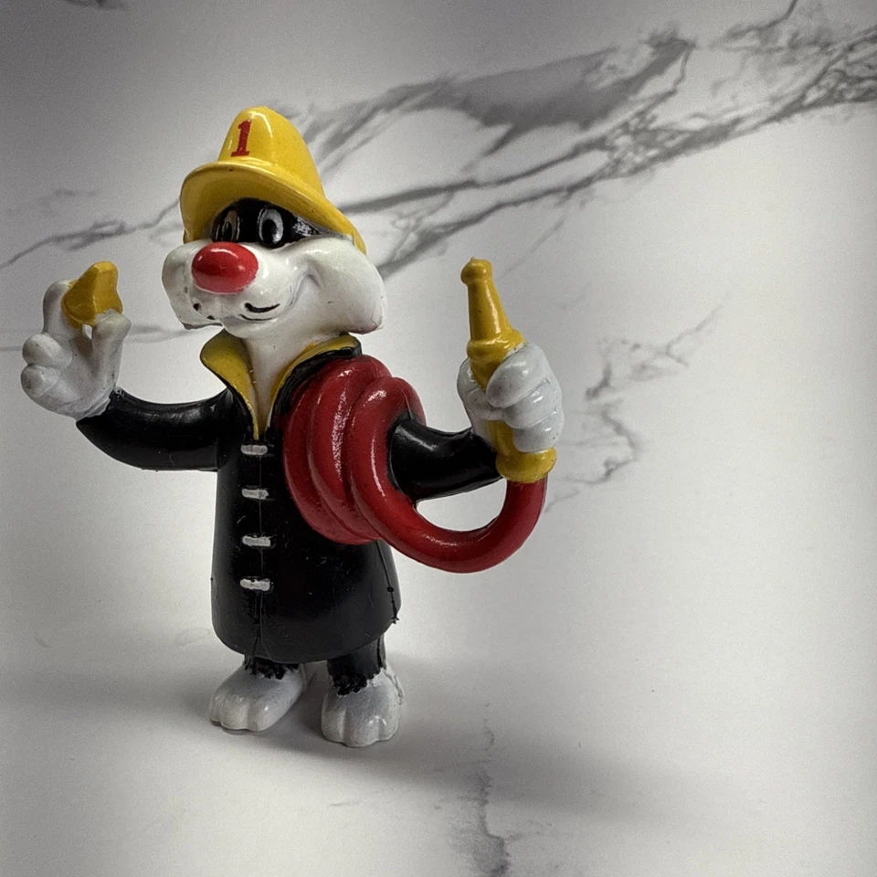 Figuras de colección 1989 Arbys Sylvester El gato bombero juguete Looney Tunes Warner Bro Foto 2 de 4