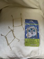 Three Plate Hangers. One New In Package, Two No Package