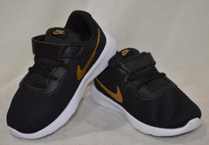 boys black and gold shoes