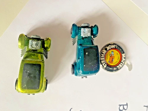 Hotwheels, two 1968 Ford Vickey redline with button