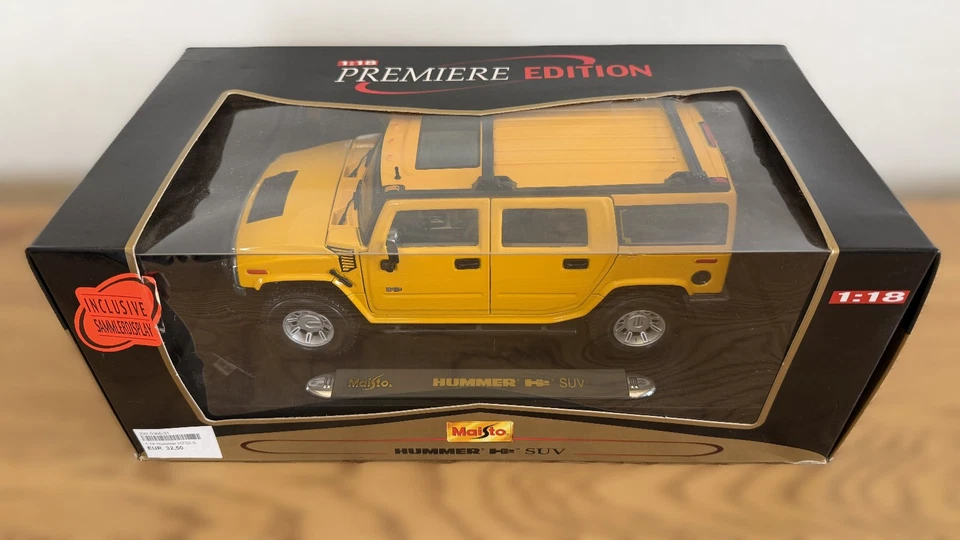Maisto Premiere Edition Hummer H2 SUV 1:18 giallo confezione originale - Immagine 2 di 4