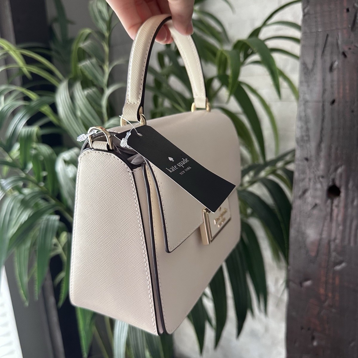 kate spade Cream “Reegan” Top-Handle Saffiano Leather Crossbody