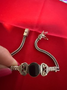 Vintage Silver bracelet featuring an oval black onyx stone and chain band