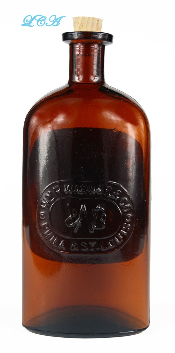 Antique ELIXIR CODEINE bottle LARGE amber WARNER SPECIAL embossed