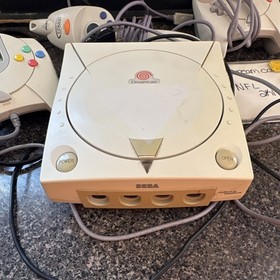 SEGA Dreamcast Console with Controllers, Fishing Controller, and Games Lot