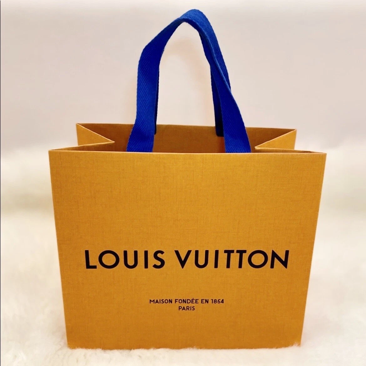 Image result for louis vuitton paper shopping bag yellow