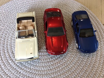 Three diecast sports cars