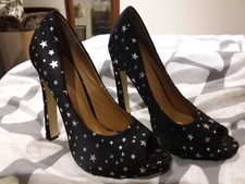 Odeon black shoes with silver stars size 6 barely worn
