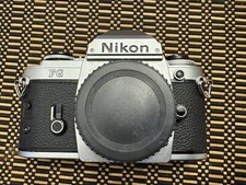 Nikon FG 35mm SLR Film Camera Body Missing Advance Lever/ Battery Cover