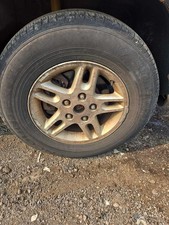 Used Wheel Fits 2004 Jeep Grand Cherokee Aluminum 16x7 5 Pairs Of Parallel Spok Used Wheel Fits 2004 Jeep Grand Cherokee Aluminum 16x7 5 Pairs Of Parallel Spok