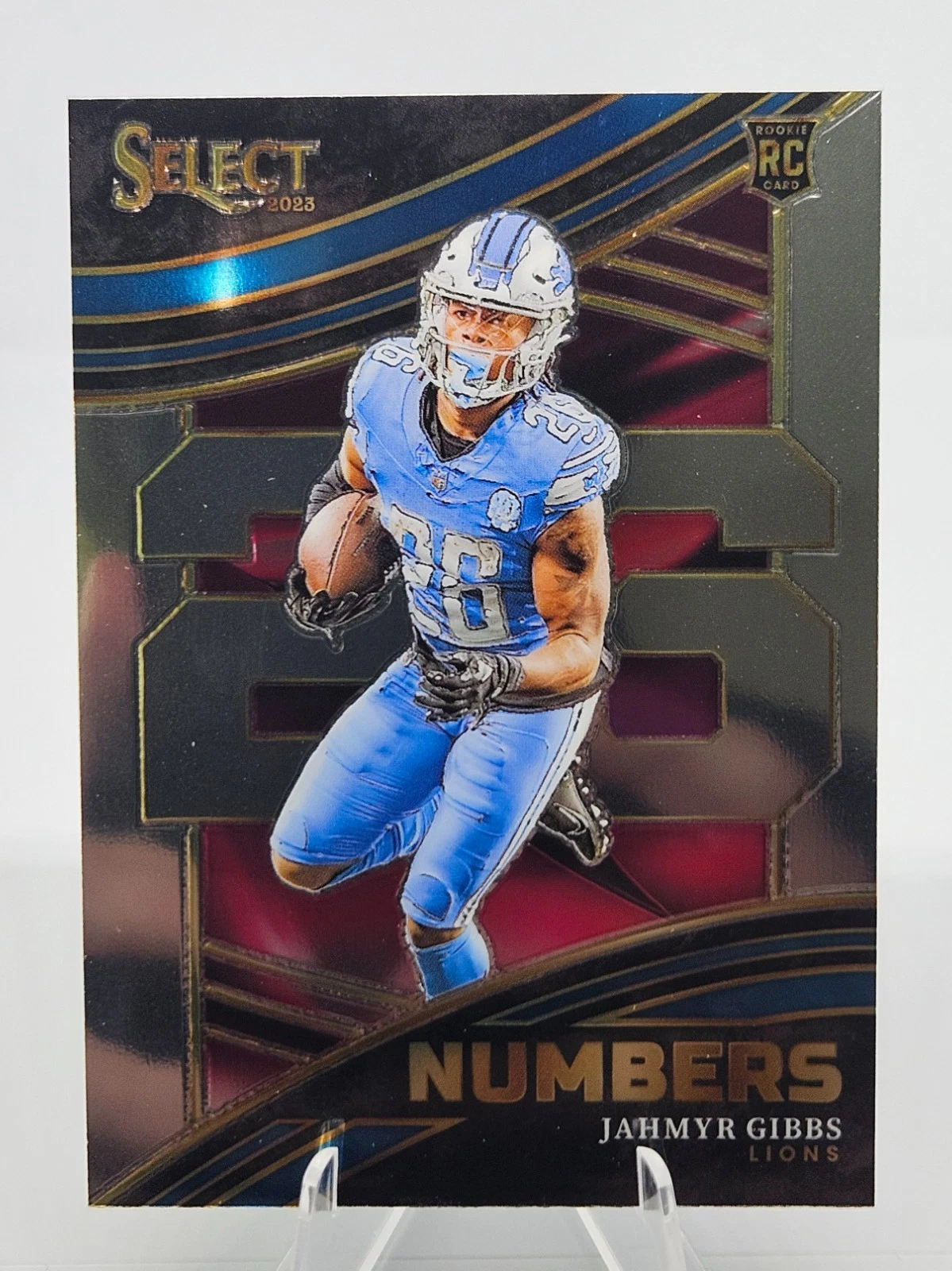 Jahmyr Gibbs Panini Select Select Numbers #NMBJGI Green & Black Snakeskin Prizm