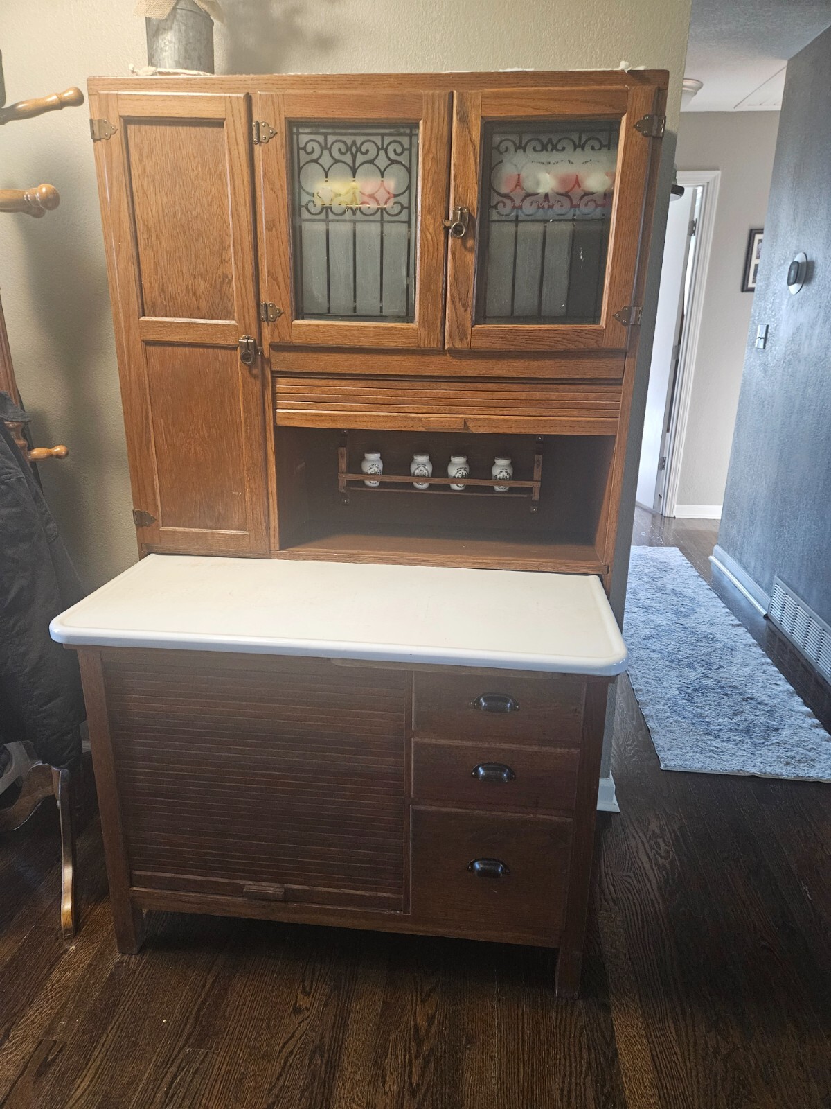 Antique Hoosier for sale. Made of oak with roll top and glass