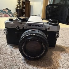 Olympus OM-10 35mm Film SLR Camera w/ 50mm f/1.8 Lens