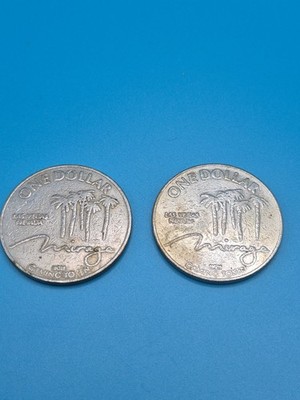 2 Vintage $1 Gaming Tokens from the Mirage Hotel and Casino in Las Vegas