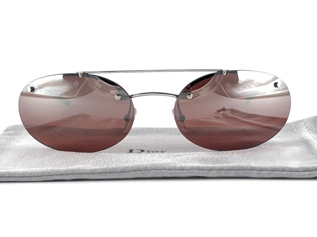 VINTAGE CHRISTIAN DIOR PEACE SILVER FRAME MIRRORED LENSES