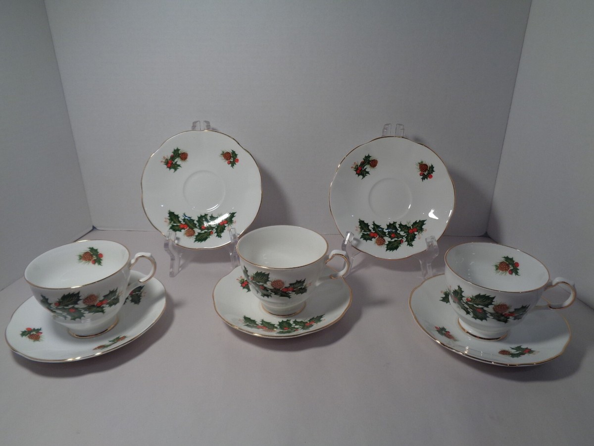 VINTAGE ROYAL CREST PEDESTAL CHRISTMAS TEA CUPS AND SAUCERS- BONE CHINA  ENGLAND