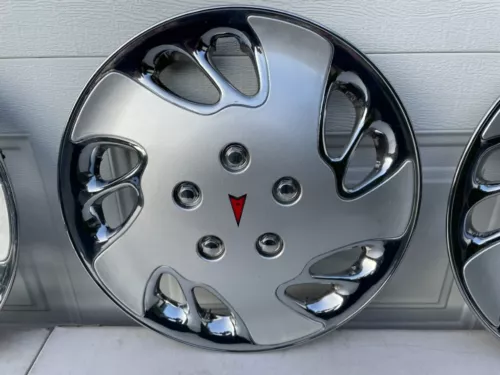 Set of 4 Wheelcovers  for 1990-1996 Pontiac Transport or Other with 15" wheels.