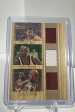 2007-08 Topps Trademark Moves Garnett, McGrady, Okur  /199 All-Star Game-worn