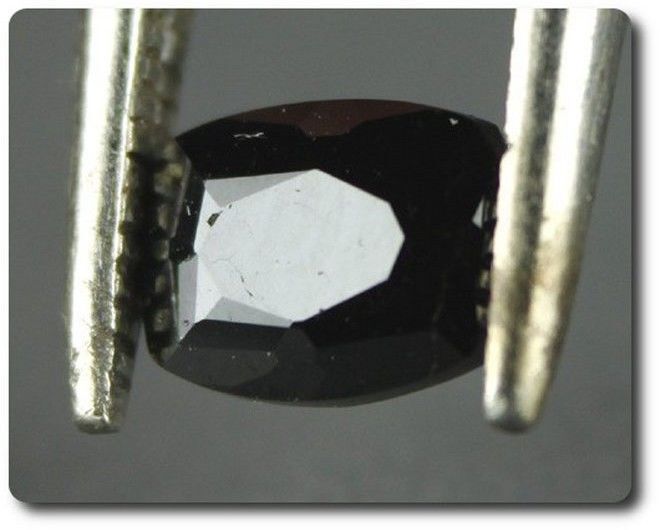 Grenat mélanite du Mali 1.23 cts, cristal brut taillé pour collection de minéraux rares