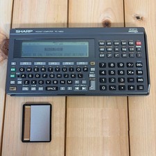 SHARP PC-1480U Pocket Computer 128KB RAM Upgraded Tested Working w/RAM Card