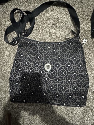 black and gray geometric patterned Baggallini crossbody organizer bag
