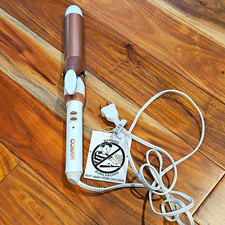 Conair CD701XN 1 1/4 in Ceramic Curling Iron Turbo Heat 400F White/Rose