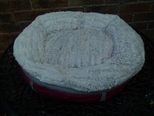 Red doughtnut bed for cat or small dog
