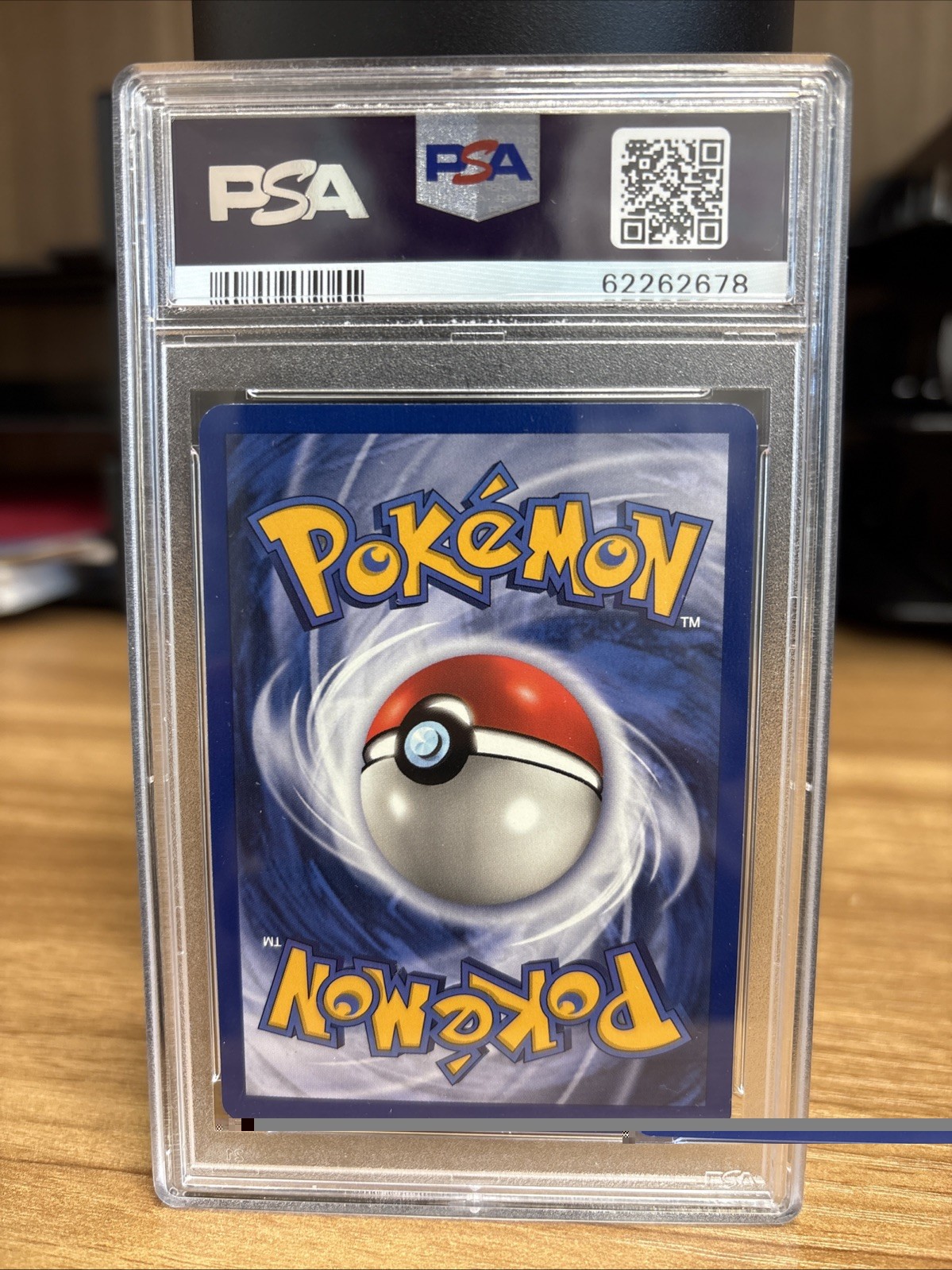 1999 Pokemon Fossil 1st Edition #14 Raichu - Holo PSA 7 NM view 2