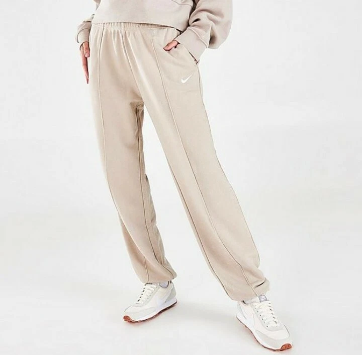 Nike Plus Mini Swoosh Oversized joggers in Natural