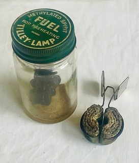 Tilley meths jar with two lamp lighting torches