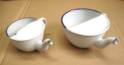 2  white enameled  metal  infant/invalid  feeders,  same design, different sizes