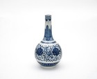 A Blue and White Inter-Locking Floral Long Neck Vase — photo 1