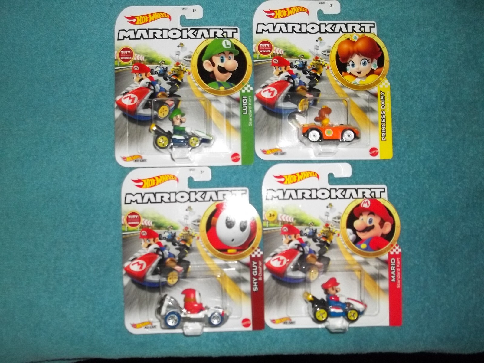 4 Hot Wheels MARIOKART diecast toys