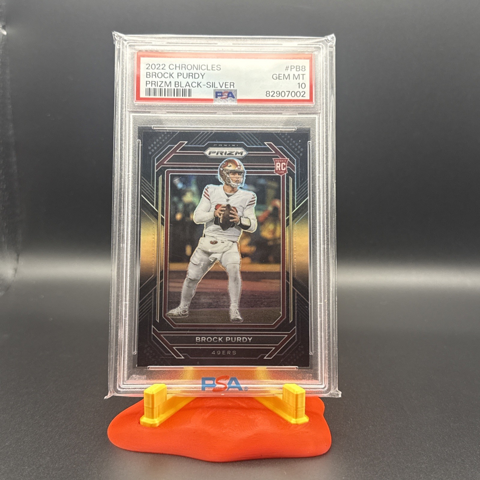 2022 Panini Chronicles Brock Purdy Prizm Black Silver RC PSA 10 view 1