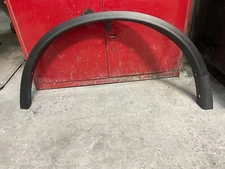 2014-2020 Nissan Rogue Wheel Arch Trim, OEM Part# 63861-9TA1A (Left Front).