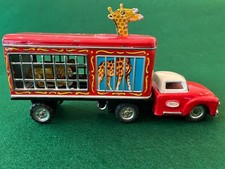 VINTAGE WORLD CIRCUS TIN FRICTION TRUCK W/LIONS  GIRAFFES JAPAN 1950  s