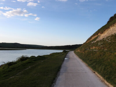 Photo 6x4 Eastern Side of Cuckmere Flood Plain Exceat The chalk downland  c2009