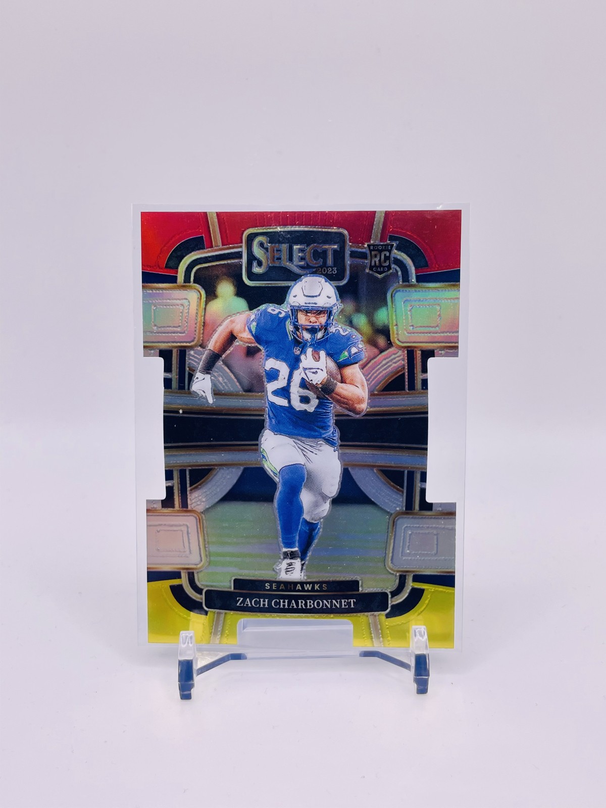 2023 Panini Select - Concourse Zach Charbonnet #86 Red & Yellow Prizm Die-Cut...