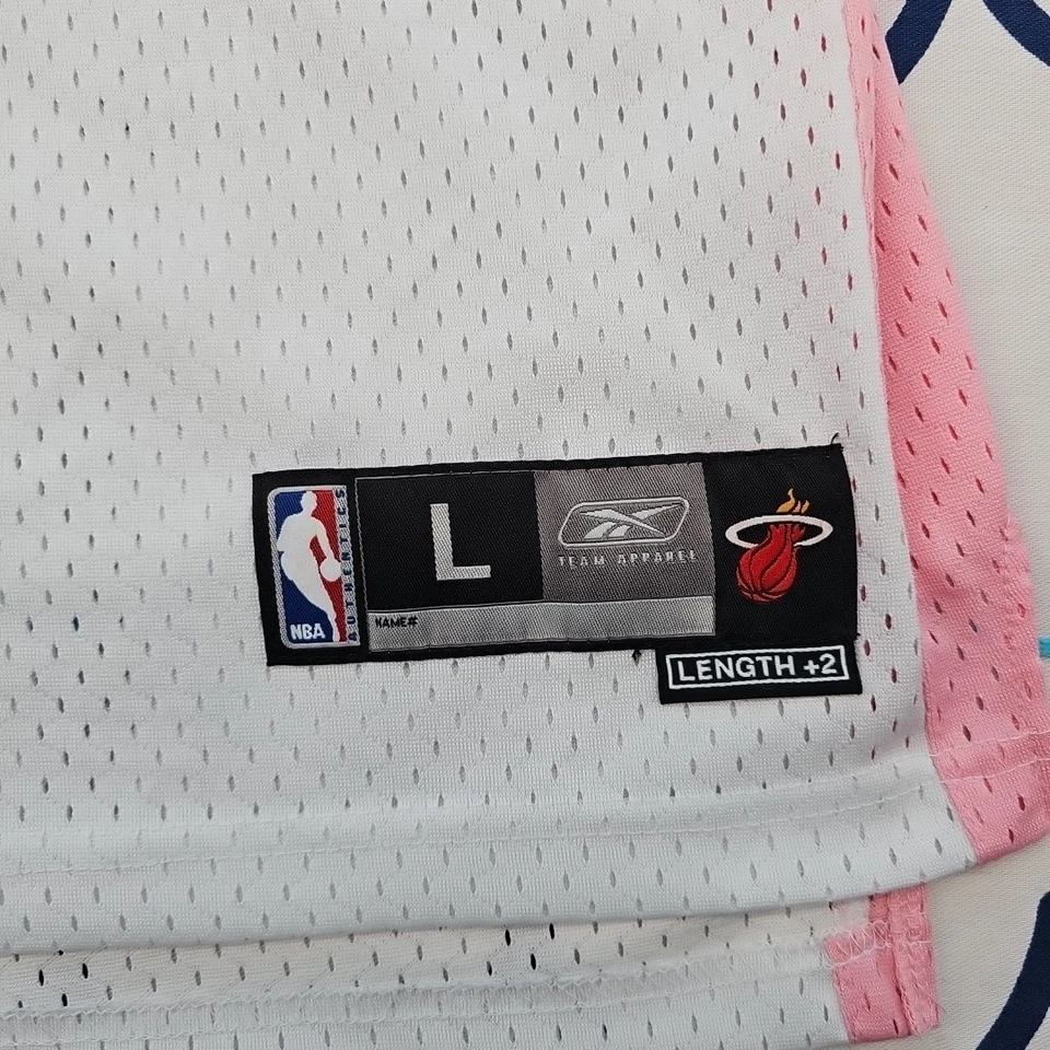Camiseta deportiva vintage Miami Heat Dwayne Wade 3 rosa y blanca de Reebok talla L Foto 4 de 4