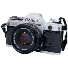 Serviced Good Condition Canon AE 1 CANON LENS FD 50mm F1.8 Film Camera Body Lens