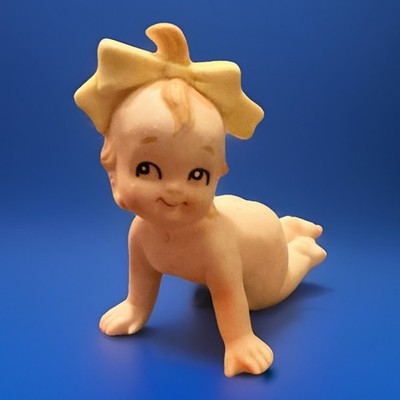 Kewpie Bisque Figurine Baby Girl With Yellow Bow