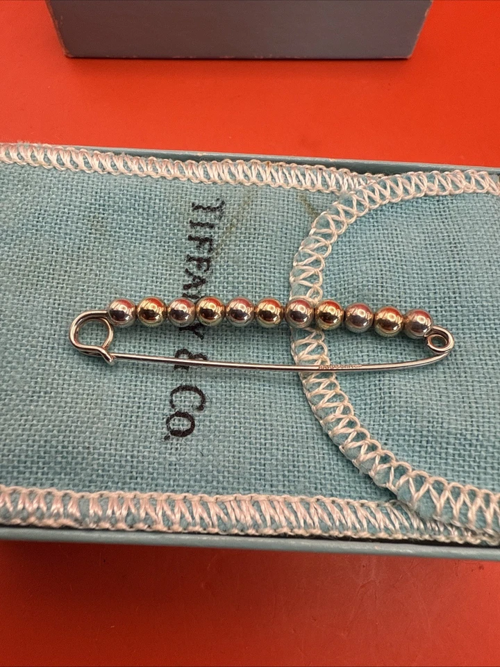 Prendedor vintage de bolas de oro de 14 k y plata de ley de Tiffany & Co. Foto 2 de 4