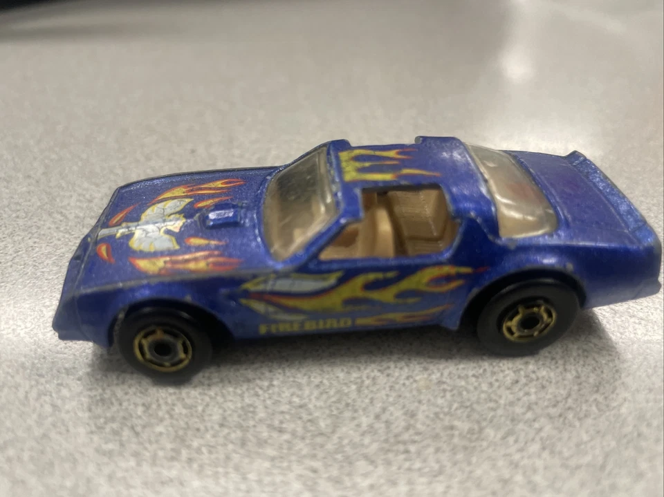 Pontiac Firebird GHO Hot Bird 1977 vintage Hot Wheels Mattel azul Malasia Foto 2 de 4