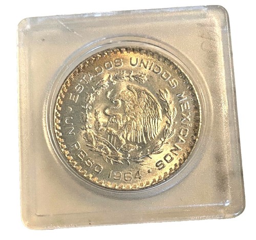 Rhodesia | 1 Shilling / 10 Cents Coin | Elizabeth II | Pickaxe Rhodesia | 1 Shilling / 10 Cents Coin | Elizabeth II | Pickaxe